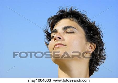 Outdoor portrait of a woman on the beach View Large Photo Image Stock Image - Outdoor portrait of a woman on the beach. Fotosearch