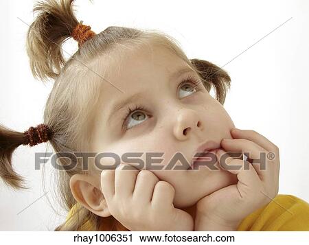 Stock Image - pensive girl. Fotosearch