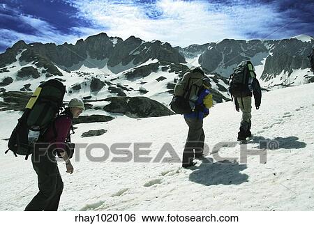Stock Photograph - People in mountains. Fotosearch