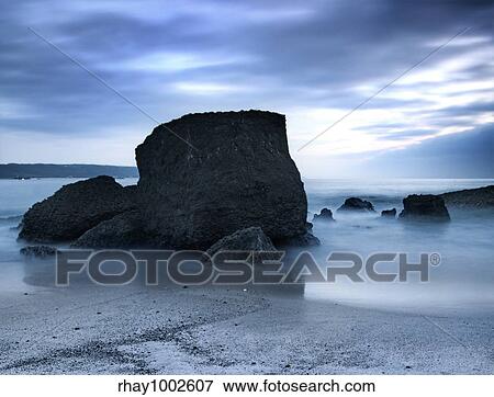 Picture of a beautiful beach at night in Long exposition mode View Large Photo Image Stock Photo - Picture of a beautiful beach at night in Long exposition mode. Fotosearch