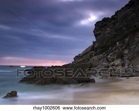 Picture of a beautiful beach at night in Long exposition mode View Large Photo Image Stock Photograph - Picture of a beautiful beach at night in Long exposition mode. Fotosearch