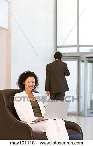 Stock Image - portrait of a business woman. Fotosearch