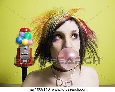 Punk Girl in front of a Green Wall Blowing a Bubble View Large Photo Image Stock Image - Punk Girl in front of a Green Wall Blowing a Bubble. Fotosearch