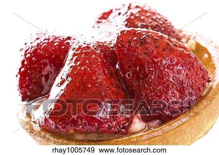Round cake with parts of a strawberry close up on a white background Round cake with parts of a strawberry close up on a white background View Large Photo Image Stock Photo - Round cake with parts of a strawberry close up on a white background Round cake with parts of a strawberry close up on a white background . Fotosearch