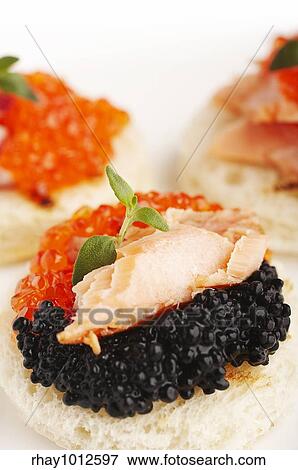 "Salmon roe, sea weed roe, smoked salmon and onion on the toasts" View Large Photo Image Stock Photo - "Salmon roe, sea weed roe, smoked salmon and onion on the toasts". Fotosearch