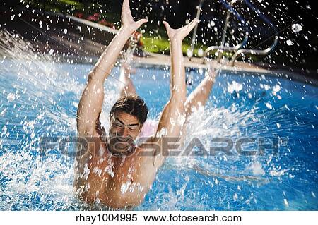 splashing in pool View Large Photo Image Stock Photography - splashing in pool. Fotosearch