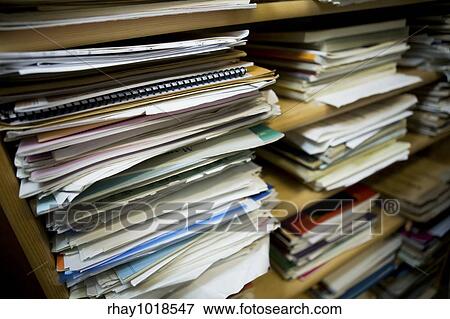 Stock Photo - Stacks of old music notes - Shallow depth of field with focus on closest papers. Fotosearch