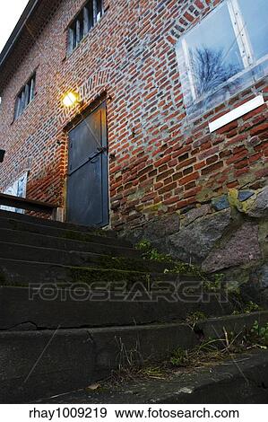 stone staircse next full of weeds to red brickwall View Large Photo Image Stock Photo - stone staircse next full of weeds to red brickwall. Fotosearch