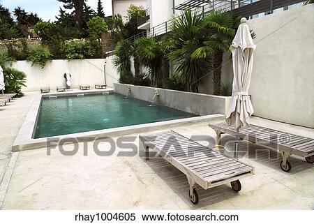 Swimming pool of mediterranean villa in French Riviera View Large Photo Image Stock Photography - Swimming pool of mediterranean villa in French Riviera. Fotosearch