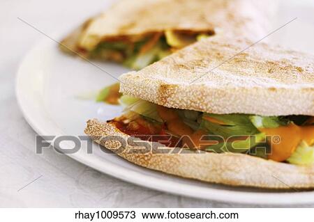tasty pizza bread wraps with fresh stuffing View Large Photo Image Stock Image - tasty pizza bread wraps with fresh stuffing. Fotosearch