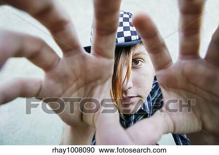 Teenage boy with crazy hair reaches to the camera. View Large Photo Image Stock Image - Teenage boy with crazy hair reaches to the camera.. Fotosearch