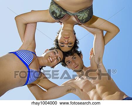 Three best friends having fun on the beach View Large Photo Image Stock Image - Three best friends having fun on the beach. Fotosearch