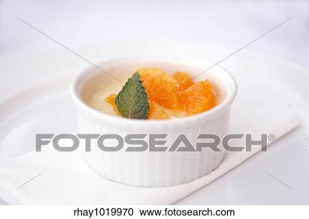 White chocolate panna cotta with mandarins and mint. Delicious dessert. View Large Photo Image Stock Image - White chocolate panna cotta with mandarins and mint. Delicious dessert.. Fotosearch