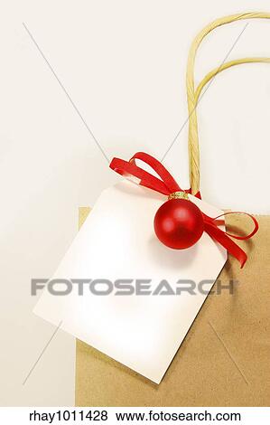 White holiday gift card with shopping bag View Large Photo Image Stock Photo - White holiday gift card with shopping bag. Fotosearch