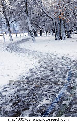 Stock Photo - "Winter park and recreational trail covered with snow. Beach area, Toronto, Canada. ". Fotosearch