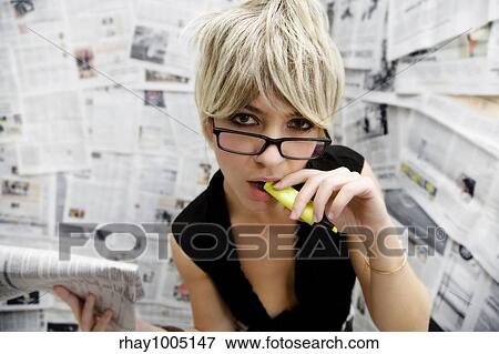 woman in newspaper lined room View Large Photo Image Stock Photo - woman in newspaper lined room. Fotosearch