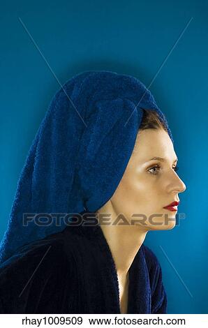 woman wearing bathrobe with big towel over her head View Large Photo Image Stock Photo - woman wearing bathrobe with big towel over her head. Fotosearch