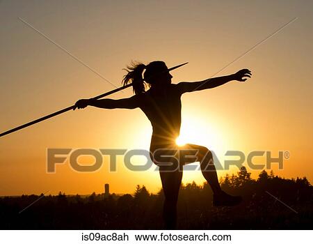 Stock Image - Athlete throwing javelin. Fotosearch