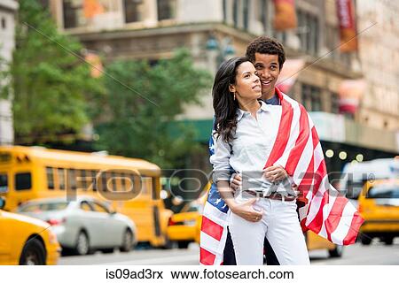 Couple with American flag View Large Photo Image Stock Photo - Couple with American flag. Fotosearch