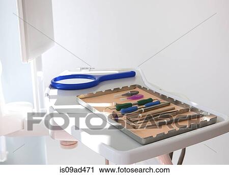 Dental clinic with surgical tray and equipment View Large Photo Image Stock Image - Dental clinic with surgical tray and equipment. Fotosearch