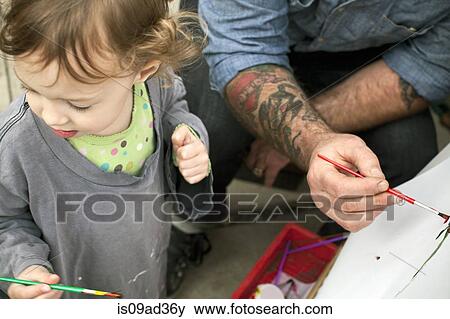 Father and daughters painting on easel View Large Photo Image Stock Photo - Father and daughters painting on easel. Fotosearch