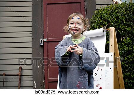 Girl outdoors painting on easel View Large Photo Image Stock Photography - Girl outdoors painting on easel. Fotosearch