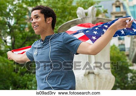 Man with American flag View Large Photo Image Stock Photo - Man with American flag. Fotosearch