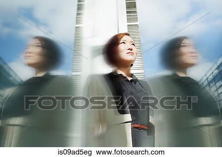 Multiple exposure portrait of young woman by modern building View Large Photo Image Stock Image - Multiple exposure portrait of young woman by modern building. Fotosearch