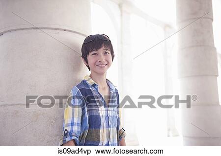 Portrait of boy wearing blue checked shirt View Large Photo Image Stock Photography - Portrait of boy wearing blue checked shirt. Fotosearch