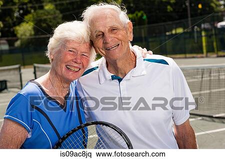 Rear view of senior man on tennis court View Large Photo Image Stock Photography - Rear view of senior man on tennis court. Fotosearch