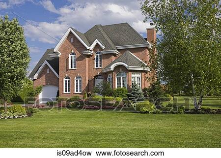Residential house and garden, Quebec, Canada View Large Photo Image Stock Photo - Residential house and garden, Quebec, Canada. Fotosearch