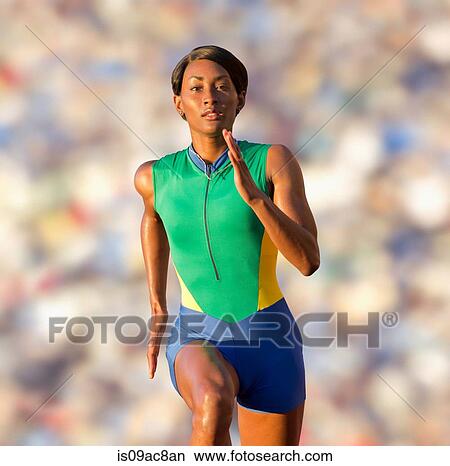 Runner racing on track View Large Photo Image Picture - Runner racing on track. Fotosearch