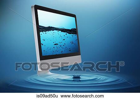 Stock Photograph - Still life with computer submerging in water. Fotosearch