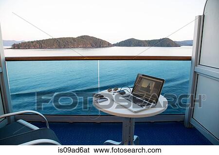 View from cruise ship with laptop on table, Alaska, USA View Large Photo Image Stock Photograph - View from cruise ship with laptop on table, Alaska, USA. Fotosearch