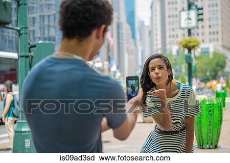 Woman blowing kiss View Large Photo Image Stock Image - Woman blowing kiss. Fotosearch