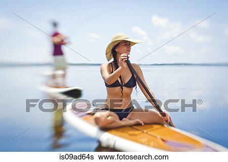 Woman canoeing, Port St Joe, Florida, USA View Large Photo Image Stock Photograph - Woman canoeing, Port St Joe, Florida, USA. Fotosearch