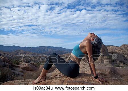 Woman sitting leaning back at Vazquez Rocks View Large Photo Image Stock Photograph - Woman sitting leaning back at Vazquez Rocks. Fotosearch