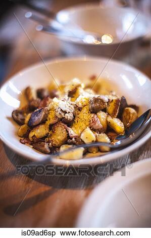 Bowl of gnocchi on table View Large Photo Image Stock Photography - Bowl of gnocchi on table. Fotosearch