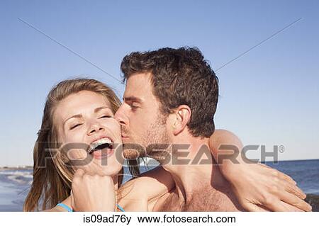 Close up portrait of couple on beach, Breezy Point, Queens, New York, USA View Large Photo Image Stock Photo - Close up portrait of couple on beach, Breezy Point, Queens, New York, USA. Fotosearch