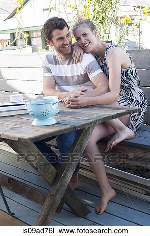 Couple at patio table, Breezy Point, Queens, New York, USA View Large Photo Image Stock Image - Couple at patio table, Breezy Point, Queens, New York, USA. Fotosearch
