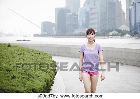 Female jogger in Shanghai, China View Large Photo Image Stock Photo - Female jogger in Shanghai, China. Fotosearch
