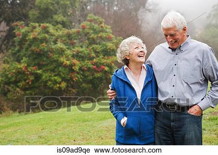 Husband and wife enjoying day out View Large Photo Image Stock Image - Husband and wife enjoying day out. Fotosearch