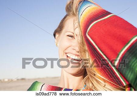 Portrait of young woman with blanket, Breezy Point, Queens, New York, USA View Large Photo Image Stock Photo - Portrait of young woman with blanket, Breezy Point, Queens, New York, USA. Fotosearch