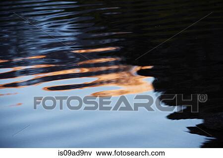 Reflection on water, Maroon Lake, Aspen, Colorado, United States of America View Large Photo Image Stock Photo - Reflection on water, Maroon Lake, Aspen, Colorado, United States of America. Fotosearch