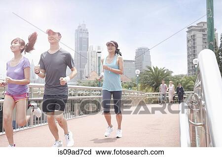 Stock Image - Runners in Shanghai, China. Fotosearch