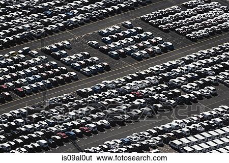 Stock Photograph - Aerial view of parked cars, waiting to be sold, Port Melbourne, Melbourne, Victoria, Australia. Fotosearch