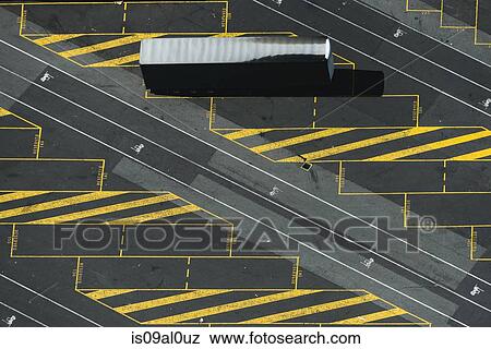 Aerial view of parked container truck, Port Melbourne, Melbourne, Victoria, Australia View Large Photo Image Stock Photo - Aerial view of parked container truck, Port Melbourne, Melbourne, Victoria, Australia. Fotosearch