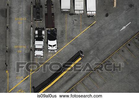 Aerial view of parked trucks, Port Melbourne, Melbourne, Victoria, Australia View Large Photo Image Stock Photograph - Aerial view of parked trucks, Port Melbourne, Melbourne, Victoria, Australia. Fotosearch