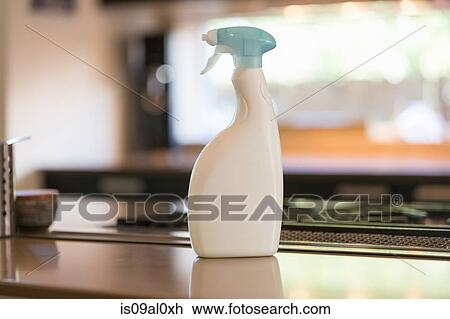 Stock Image - Cleaning home with green cleaning products. Fotosearch