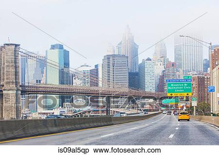 Stock Photography - Highway and Brooklyn Bridge, Lower Manhattan, New York, USA. Fotosearch